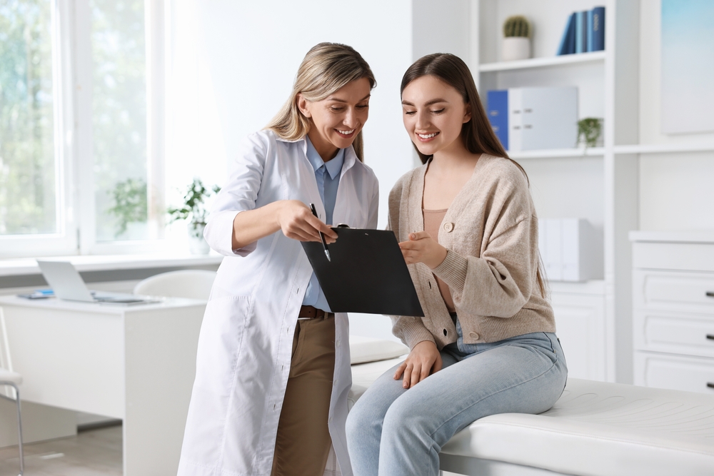 woman talking to doctor.