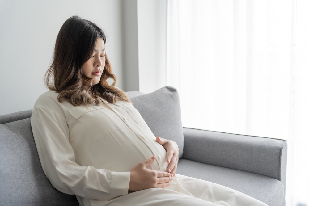 worried pregnant woman concerned and anxious.